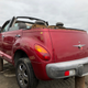 Illustration for article titled This Junkyard PT Cruiser Landaulet Proves Some Battles Can't Be Won